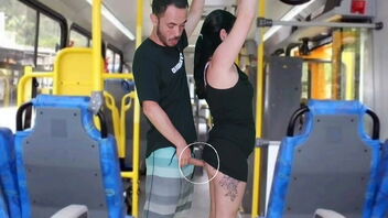 A pervert wanks on a bus and cum on a slender brunette.