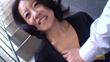 Japanese Cougar gets a facial after a red-hot blowjob and magic wand session